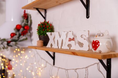 Christmas decorated kithen in loft style. Red colors. Modern loft style of interior dacorated for New Year Eveの写真素材