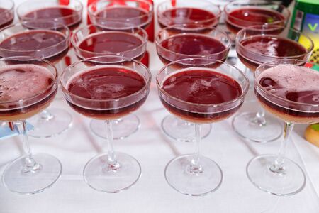 Close up of glasses of New York sour cocktail on the holidayの写真素材