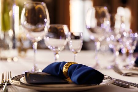 Wine glasses and champagne flutes on table, Wedding decor. Selective focusの写真素材
