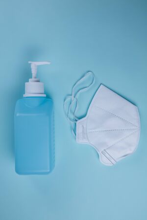 Coronavirus prevention medical mask and hand sanitizer gel for hand hygiene corona virus or covid-19 protection. antiviral medical mask for protection against coronavirus.の写真素材
