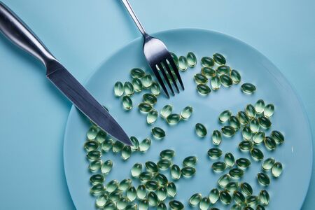 Diet only on pills and medicines. Plate with pillsの写真素材