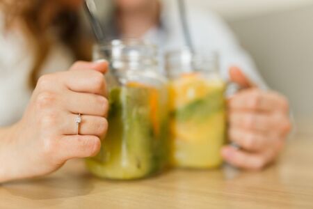 Romantic couple dating in cafe, drink smoothies.の写真素材
