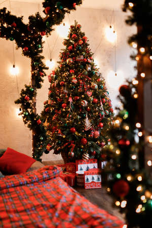 Christmas Balls And Decorations On A Beautiful Christmas Tree. Decorated Christmas Interior. Place For Text.の写真素材