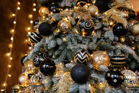Christmas Balls And Decorations On A Beautiful Christmas Tree. Decorated Christmas Interior.の写真素材