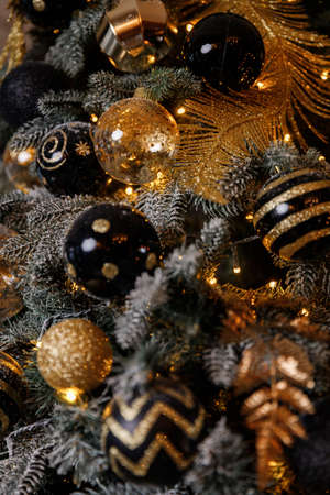 Christmas Balls And Decorations On A Beautiful Christmas Tree. Decorated Christmas Interior.の写真素材