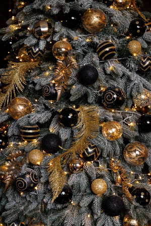 Christmas Balls And Decorations On A Beautiful Christmas Tree. Decorated Christmas Interior.の写真素材