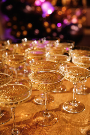 Glasses with Sparkling Wine. Celebration, party concept with champagne glasses. Selective focus.の写真素材