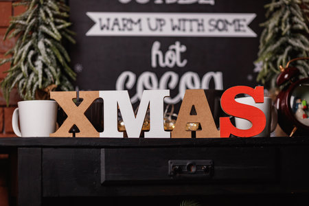 XMAS letters - Christmas writing with gift boxes - product photography.の写真素材
