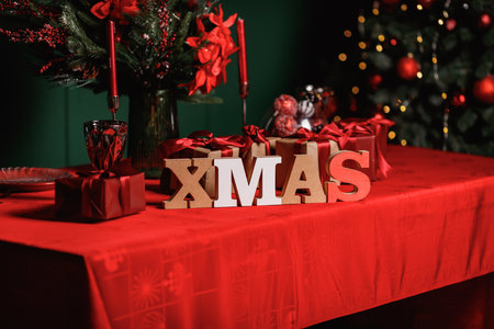XMAS letters with red gift boxes - Christmas writing with gift boxes - product photography.の写真素材