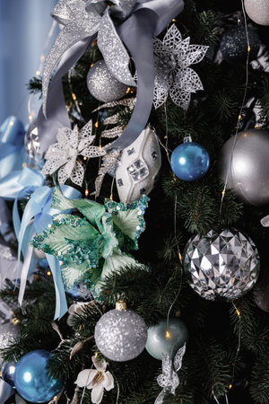 Blue, white and silver balls on Christmas tree.の写真素材