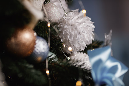 Blue, white and silver balls on Christmas tree.の写真素材
