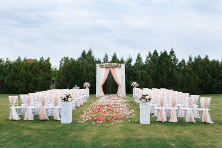Wedding ceremony decor in white colors
