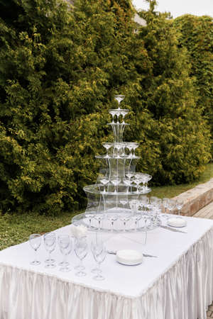Empty glasses on a champagne slide, hillの写真素材