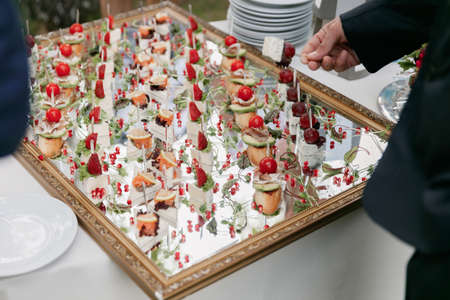 Canape appetizers with strawberries and Brie soft cheeseの写真素材