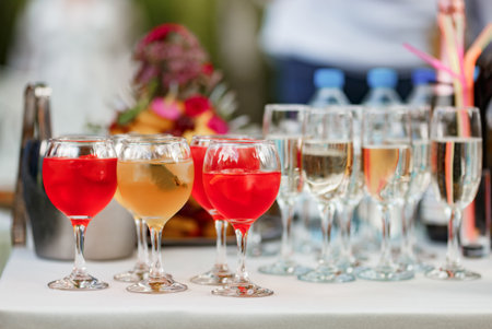 lemonades in glasses with ice at a summer partyの写真素材