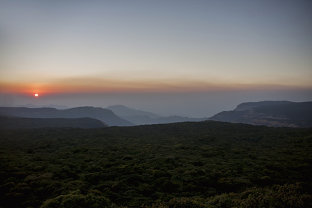 Warm mountain sunset.の写真素材