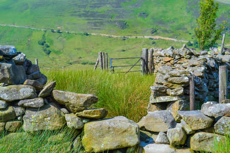 Sheep pen in the mountains made of large stoneの写真素材