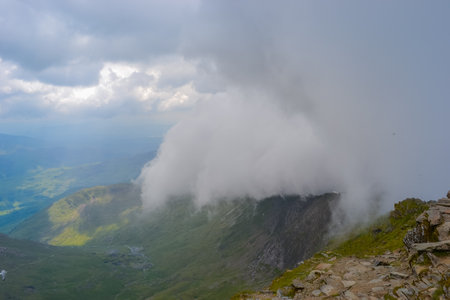 Snowdonia National Park. Epic views of mountains and valleys covered with vibrant grass and soft mossの写真素材
