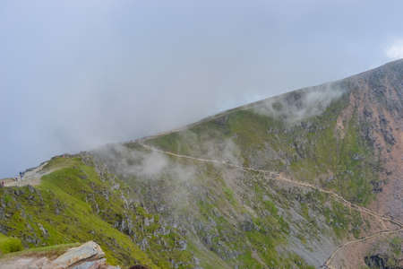 Snowdonia National Park. Epic views of mountains and valleys covered with vibrant grass and soft mossの写真素材