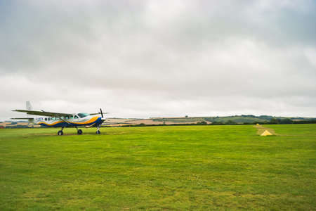 UK, Salisbury, 15.08.2021: a small plane from 'GoSkydive' awaits people to land for parachute...