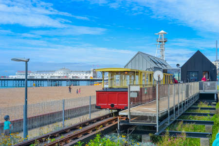 UK, Brighton, 11.07.2021: Volk's Railway, vintage tram along the most popular walking beach in Brightonのeditorial素材
