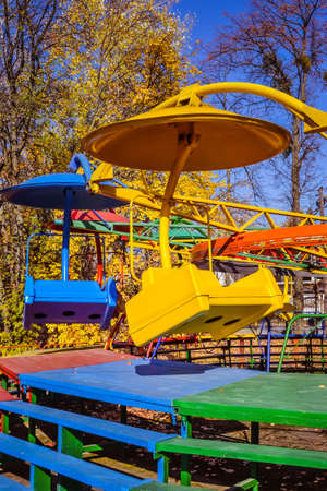 Old soviet rides in the autumn park.の写真素材