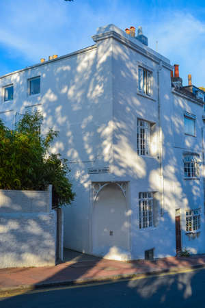 UK, Brighton, 02.09.2021: Streets of Brighton - a private sector with snowy white houses and quiet streets in the hillsのeditorial素材