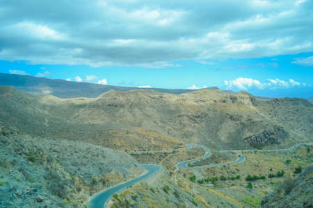 Mountains of the island of Gran Canaria, originally - this is a volcano and the landscape was formed as a result of its activityの写真素材