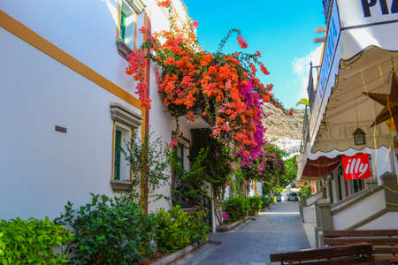 Spain, Gran Canaria, 18.09.2021: Streets of a popular tourist destination (Mogan) in Italian styleのeditorial素材