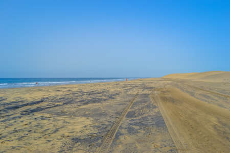 Yellow sand with volcanic black sandの写真素材