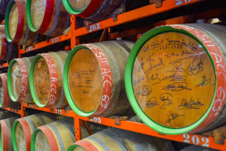 Spain, Gran Canaries, 20.09.2021: Canaries rum factory. Large barrels of rum of different years. Celebrity autographs and local markings on barrels.のeditorial素材