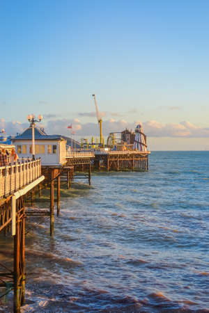 UK, Brighton, 01.10.2021: Brighton's big famous pier. Close up view during sunsetのeditorial素材