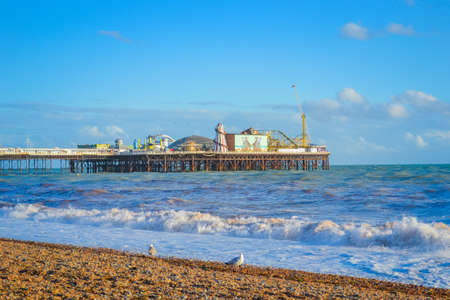 UK, Brighton, 01.10.2021: Brighton's big famous pier. Close up view during sunsetのeditorial素材