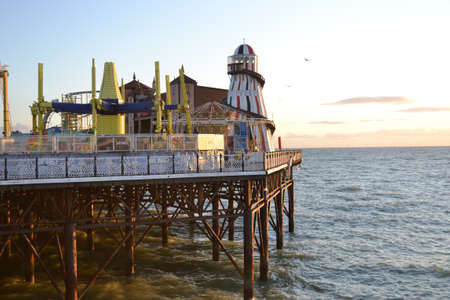 UK, Brighton, 01.10.2021: Brighton's big famous pier. Close up view during sunsetのeditorial素材