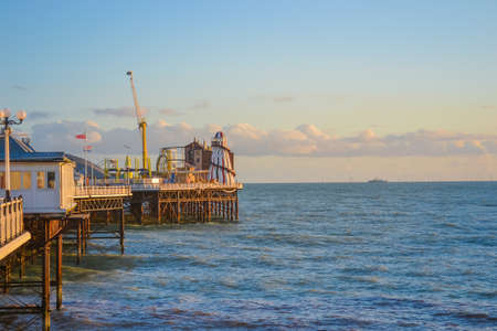 UK, Brighton, 01.10.2021: Brighton's big famous pier. Close up view during sunsetのeditorial素材