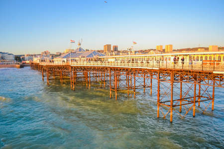 UK, Brighton, 01.10.2021: Brighton's big famous pier. Close up view during sunsetのeditorial素材