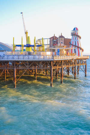UK, Brighton, 01.10.2021: Brighton's big famous pier. Close up view during sunsetのeditorial素材
