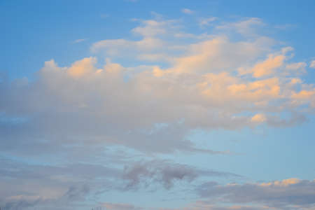 Blue sky and white clouds before sunset.の写真素材