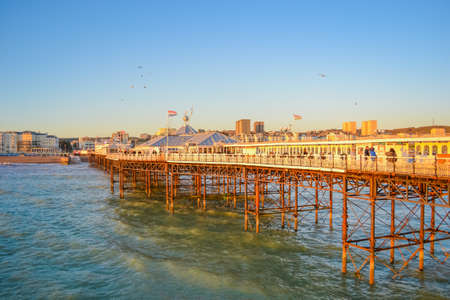 UK, Brighton, 01.10.2021: Brighton's big famous pier. Close up view during sunsetのeditorial素材
