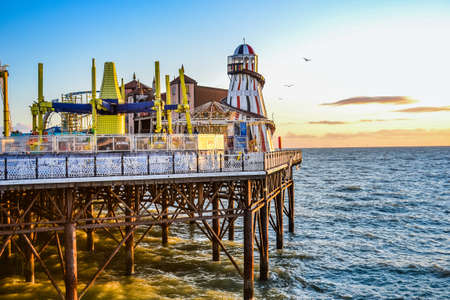 UK, Brighton, 01.10.2021: Brighton's big famous pier. Close up view during sunsetのeditorial素材