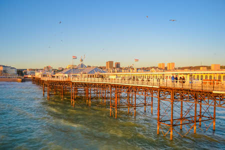 UK, Brighton, 01.10.2021: Brighton's big famous pier. Close up view during sunsetのeditorial素材
