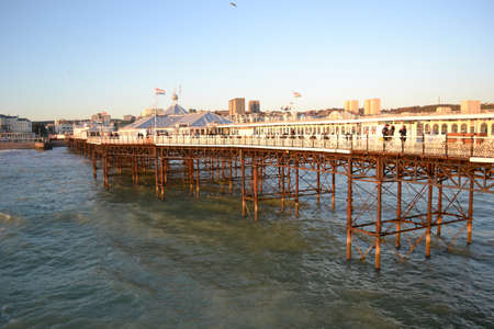UK, Brighton, 01.10.2021: Brighton's big famous pier. Close up view during sunsetのeditorial素材