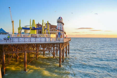 UK, Brighton, 01.10.2021: Brighton's big famous pier. Close up view during sunsetのeditorial素材