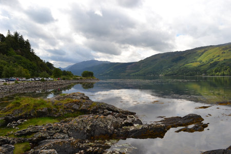 View of Loch Lomond, Scotland, UK, with a cloudy sky