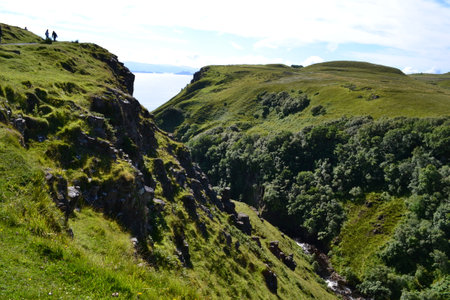 Green mountains and hills of scotland in the Highlandsの写真素材
