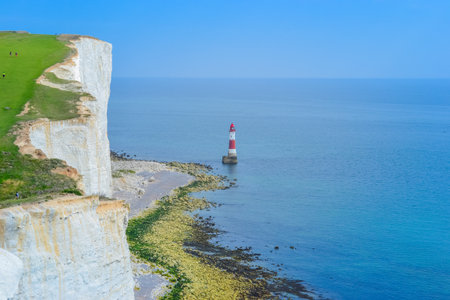 Cliff top travel with the view on the beach and seaの写真素材