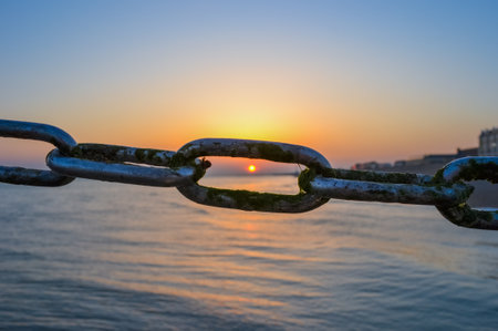 Coiled rope and sea sunsetの写真素材