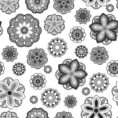 Seamless floral background. Isolated black and white doodle style flowers on white background.の写真素材