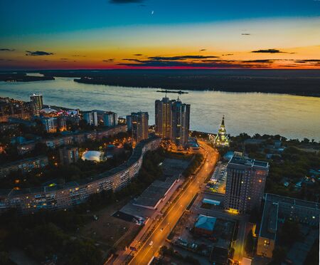Night city Samara, aerial panorama with many living and commercial buildingの写真素材