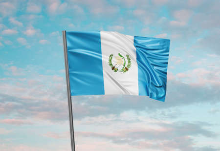 Guatemala national flag waving in the wind. Sky background 3D illustrationの写真素材